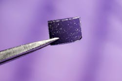 Flakes of niobium oxide dichloride on a sample holder. Flakes of niobium oxide dichloride on a sample holder.