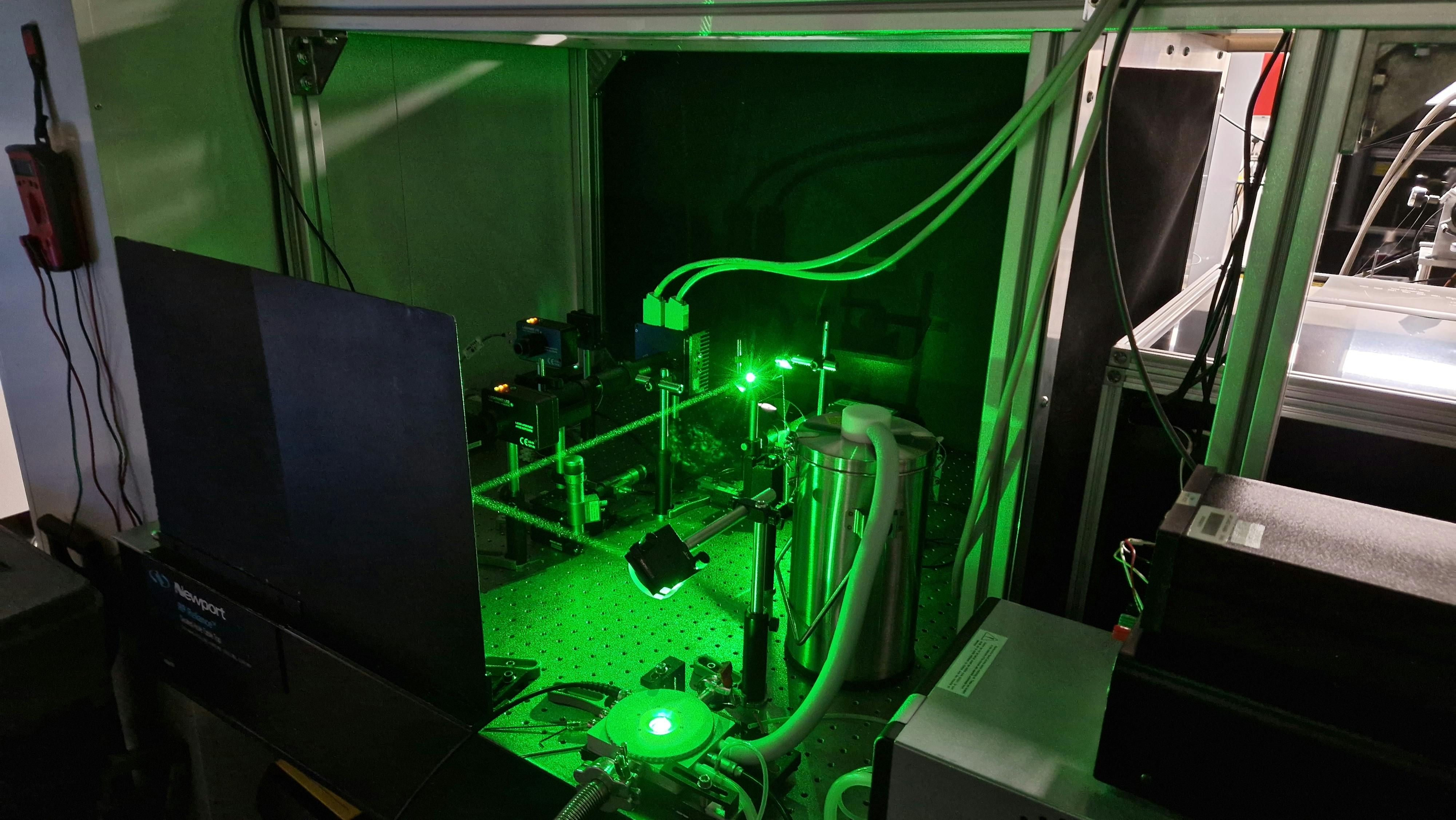 Cryogenic testing setup in Sweeney&rsquo;s lab: A solar cell is held under cryogenic conditions (-196&deg;C) while being powered by a laser.