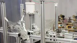 Scientist Will Zhang has created a manufacturing facility to create x-ray optics made of silicon. This image shows a polishing setup.