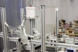 Scientist Will Zhang has created a manufacturing facility to create x-ray optics made of silicon. This image shows a polishing setup. Scientist Will Zhang has created a manufacturing facility to create x-ray optics made of silicon. This image shows a polishing setup.