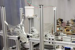 Scientist Will Zhang has created a manufacturing facility to create x-ray optics made of silicon. This image shows a polishing setup. Scientist Will Zhang has created a manufacturing facility to create x-ray optics made of silicon. This image shows a polishing setup.