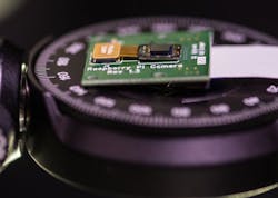 The very small matte-black rectangle attached to the circuit board is Rice University’s FlatCam, an ultrathin lensless camera. The very small matte-black rectangle attached to the circuit board is Rice University’s FlatCam, an ultrathin lensless camera.