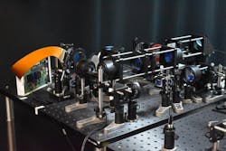 Two-photon fluorescence microscope setup, with optical components including the digital micromirror and beam scanners. Two-photon fluorescence microscope setup, with optical components including the digital micromirror and beam scanners.
