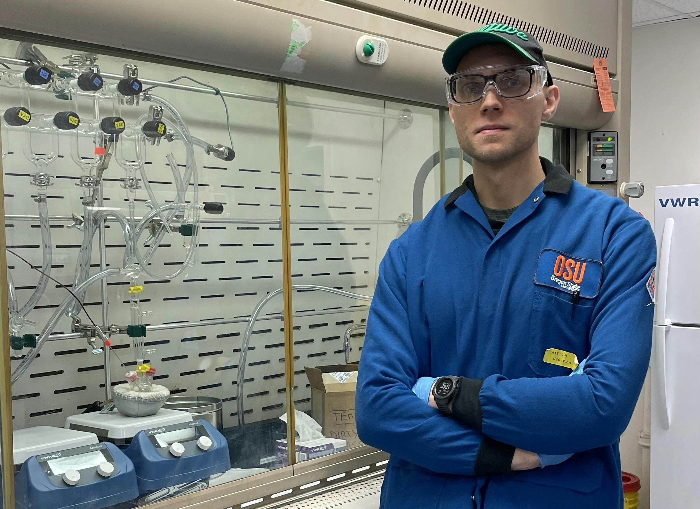 Artiom Skripka in front of a fume hood where the scientists synthesize their nanomaterials. (Photo credit: Artiom Skripka)