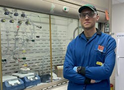 Artiom Skripka in front of a fume hood where the scientists synthesize their nanomaterials. (Photo credit: Artiom Skripka) Artiom Skripka in front of a fume hood where the scientists synthesize their nanomaterials. (Photo credit: Artiom Skripka)