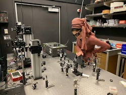 Natalie Fardian-Melamed in the lab with the scanning probe—an inverted-optical microscope setup. (Photo credit: William P.D. Hayes/Columbia Engineering) Natalie Fardian-Melamed in the lab with the scanning probe—an inverted-optical microscope setup. (Photo credit: William P.D. Hayes/Columbia Engineering)