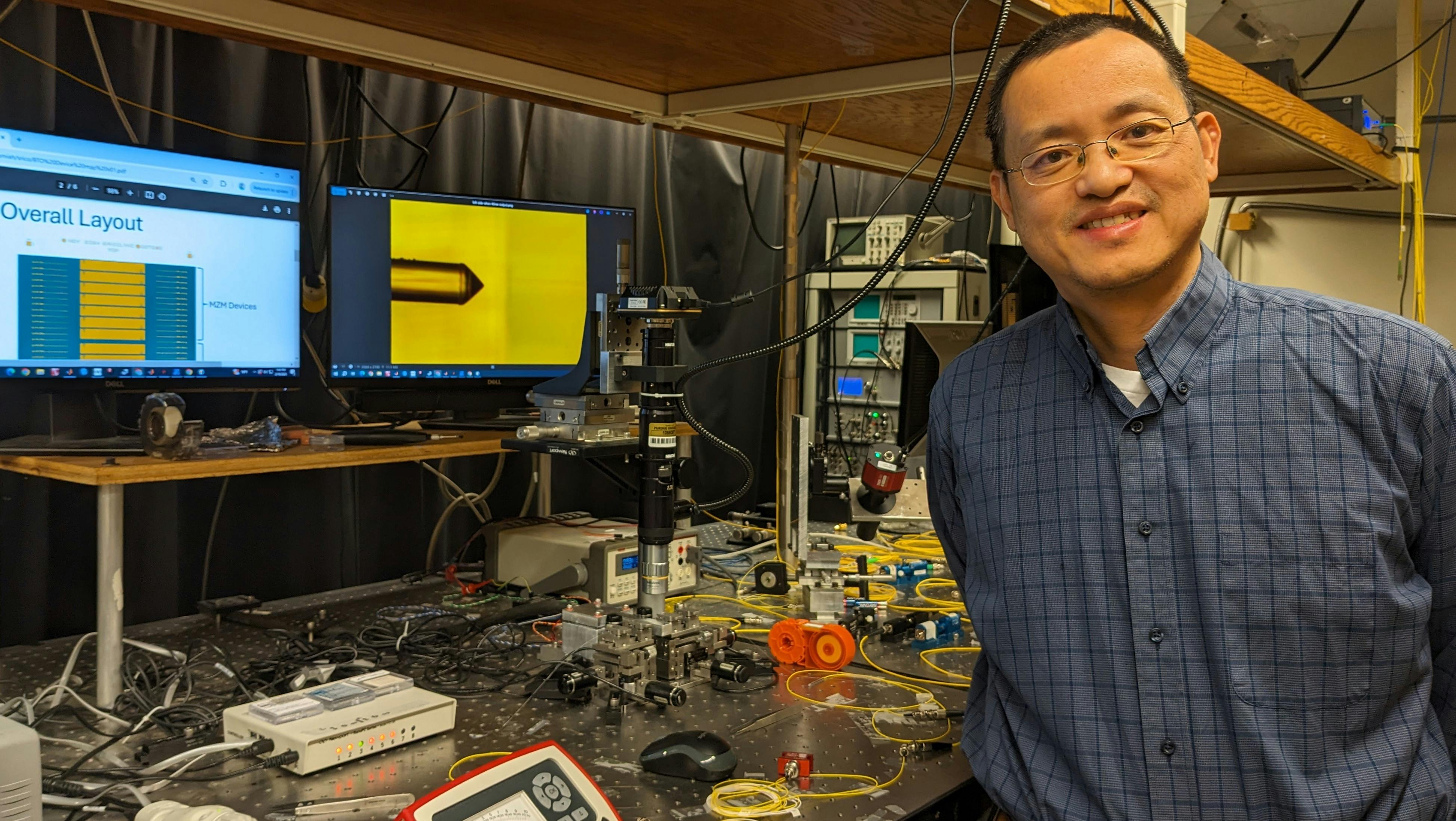 Researcher Minghao Qi, a professor at Purdue University, with the team&rsquo;s setup.