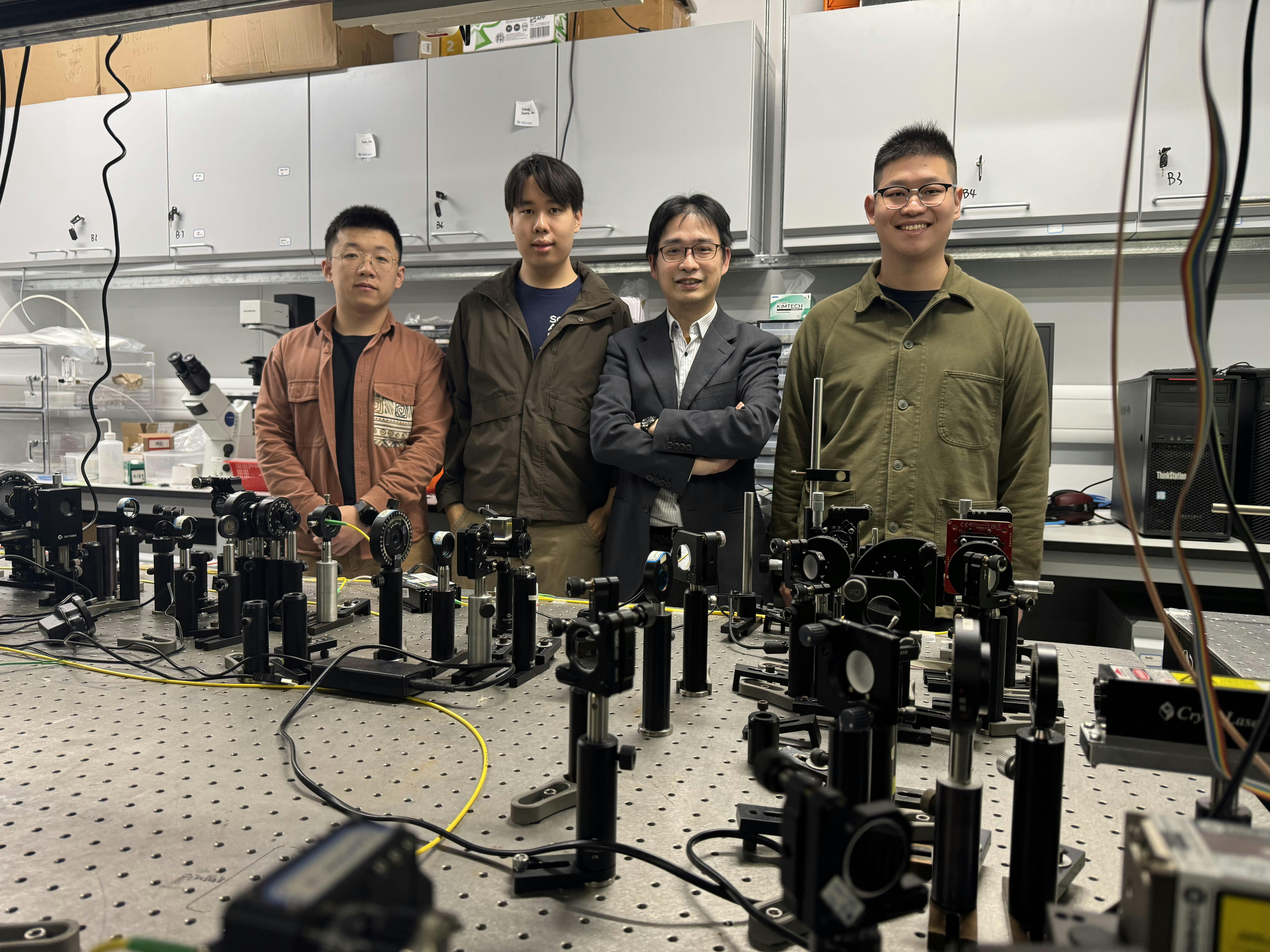 The team&mdash;left to right: Qinmiao Chen, Randy Stefan Tanuwijaya, Jensen Li, and Tailin An&mdash;with their optical setup.