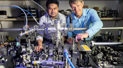 Shubhadeep Biswas, then-SLAC project scientist (left), and Matthias Kling, professor of photon science and applied physics at Stanford University and the director of the Science, Research and Development Division at SLAC's Linac Coherent Light Source (the laser isn’t on).