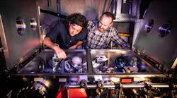 Claudio Emma and Brendan O’Shea examine experimental apparatus at FACET-II in 2022. Credit: Jacqueline Ramseyer Orrell/SLAC National Accelerator Laboratory