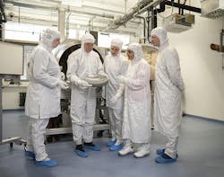 Fraunhofer IOF team working on the SHARP project in front of a batch ALD coater, which is used for precise controlled coatings of complex large-area substrates. Fraunhofer IOF team working on the SHARP project in front of a batch ALD coater, which is used for precise controlled coatings of complex large-area substrates.