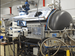FIGURE 3. High-speed camera integrated into hypervelocity impact experiment. FIGURE 3. High-speed camera integrated into hypervelocity impact experiment.