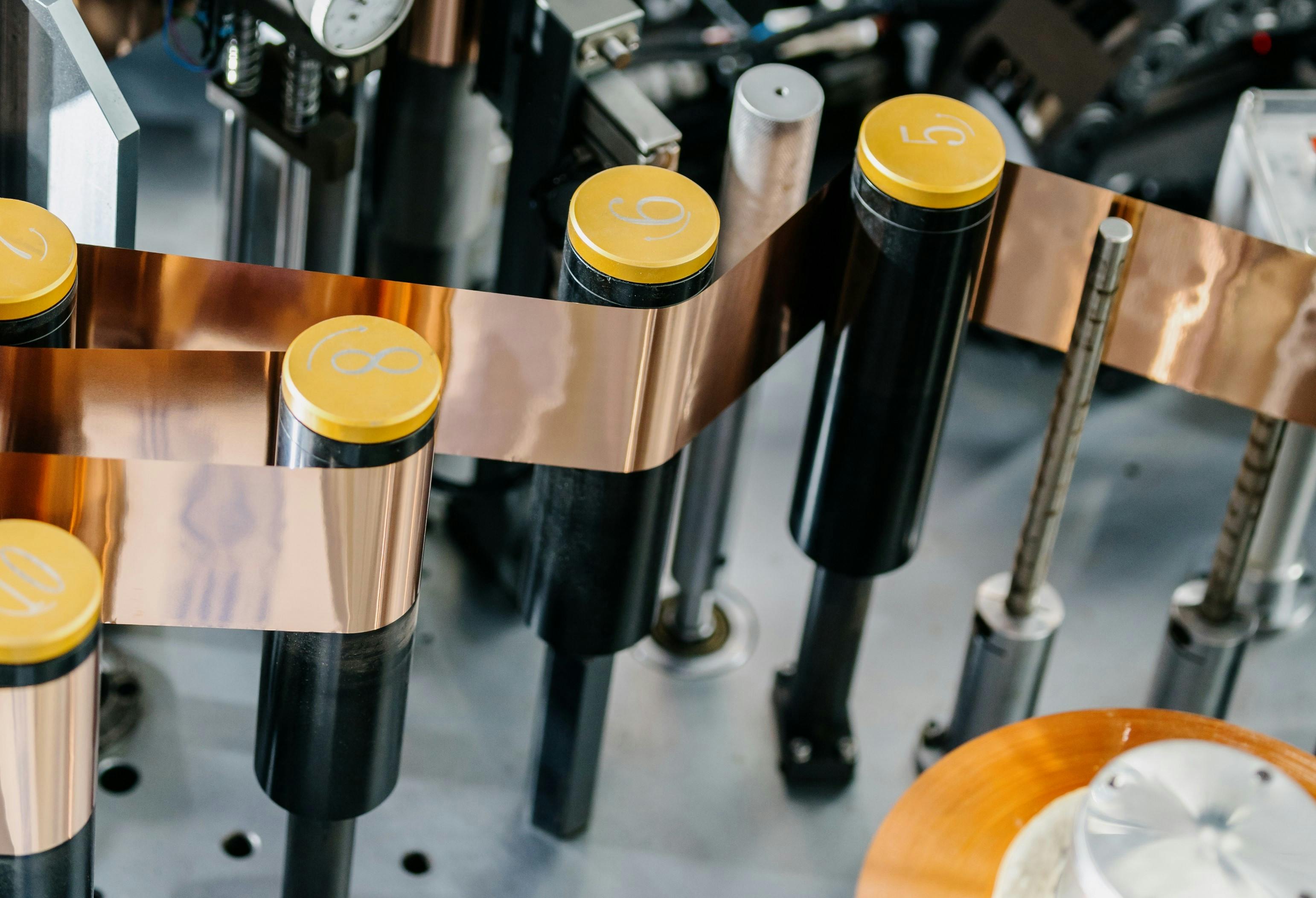 Multilayer battery foils are typically fabricated using reel-to-reel processes.