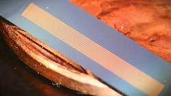 TFLN external cavity chip on a penny. Credit: Shixin Xue TFLN external cavity chip on a penny. Credit: Shixin Xue