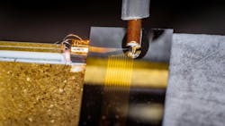 Complete laser setup with a gain chip on the left coupled to the TFLN chip on the right. A radio-frequency probe sends electric signals to the TFLN chip. Credit: Shixin Xue Complete laser setup with a gain chip on the left coupled to the TFLN chip on the right. A radio-frequency probe sends electric signals to the TFLN chip. Credit: Shixin Xue