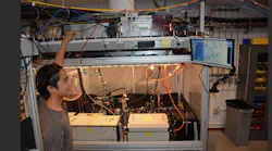 In Hutzler's laboratory at Caltech, the Matisse Ti:sapphire laser, coupled with the Mixtrain SFG system, performs spectroscopy and laser control of cold atoms and molecules used to search for new fundamental particles and forces. Above, a graduate student adjusts locking electronics on the IR Ti:sapphire seed to excite an optical transition to a metastable triplet state of neutral radium-226 atoms, which induces accelerated formation of new radium-containing molecules.