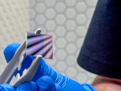 The team’s experimental device under a microscope. The team’s experimental device under a microscope.