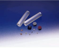 FIGURE 1. Faraday-rotator crystals can be made of rare-earth-doped yttrium iron garnet (small squares), yttrium iron garnet (cylinders), or terbium gallium garnet (large rods). FIGURE 1. Faraday-rotator crystals can be made of rare-earth-doped yttrium iron garnet (small squares), yttrium iron garnet (cylinders), or terbium gallium garnet (large rods).