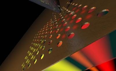 A metal nanocircuit is composed of an array of nanoscale holes in a 20-nm-thick gold film. A needle measures the voltage that is generated while the holes are illuminated.