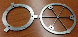 A mirror mount containing flexures is made of bulk metallic glass. This mount is intended for space optics.