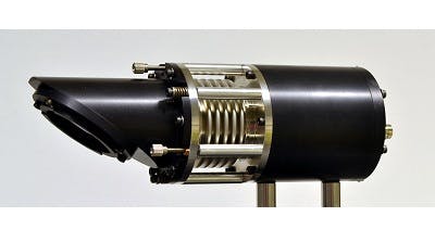 A PQED consists of a Brewster window (left) protecting the detector elements from impurities, adjustable bellows, and the detector chamber itself. To further decrease uncertainties in measurement, the window was removed and the detector was protected from impurities using nitrogen flow.