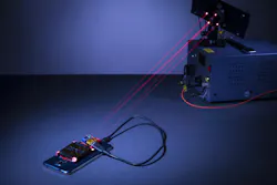 This laser-based wireless charging system was created by University of Washington engineers. The charging laser and guard lasers are normally invisible to the human eye, but red beams have been inserted here in place of the guard beams for demonstration purposes.