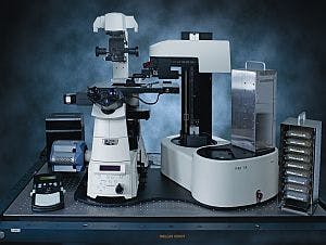A Nikon high-contrast light microscope is intended for imaging biological assays. Nikon and JEOL will work to correlate data from their microscopes (light and electron respectively).