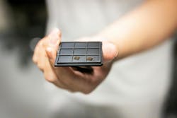 FIGURE 2. The team’s patterned aluminum gallium arsenide photonic crystal. Credit: Eric Sucar/University of Pennsylvania FIGURE 2. The team’s patterned aluminum gallium arsenide photonic crystal. Credit: Eric Sucar/University of Pennsylvania