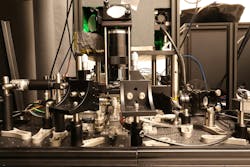 Side view of the group’s experimental setup to operate programmable nonlinear photonic waveguides. Credit: NTT Research Side view of the group’s experimental setup to operate programmable nonlinear photonic waveguides. Credit: NTT Research