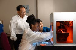 The team at the University of Houston, including (left to right) Professor Zhifeng Ren, Ange Benise Niyikiza, a Ph.D. candidate, and Senior Research Scientist Dr. Ying Peng, is studying the thermal conductivity of boron arsenide inside a frequency-domain thermoreflectance system. Credit: University of Houston The team at the University of Houston, including (left to right) Professor Zhifeng Ren, Ange Benise Niyikiza, a Ph.D. candidate, and Senior Research Scientist Dr. Ying Peng, is studying the thermal conductivity of boron arsenide inside a frequency-domain thermoreflectance system. Credit: University of Houston