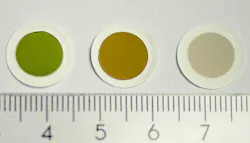 Samples of green, tan, and light gray carbon nanotube thin films, as produced in the fabrication reactor. Samples of green, tan, and light gray carbon nanotube thin films, as produced in the fabrication reactor.