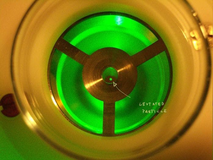 Micron sized particle in an EDB illuminated with a 532 nm laser (Photo courtesy of ETH Zurich, click on image to download)