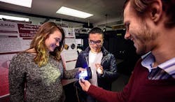 Using freeform optics to redesign automotive LED headlights earned first-place honors at the 2018 Global Capstone Design Fair in South Korea. Team members (from left) are Audrey Brand, Zhaowei Chen, and Simon Tsaoussis. Not pictured is Husam Altoonisi. Using freeform optics to redesign automotive LED headlights earned first-place honors at the 2018 Global Capstone Design Fair in South Korea. Team members (from left) are Audrey Brand, Zhaowei Chen, and Simon Tsaoussis. Not pictured is Husam Altoonisi.