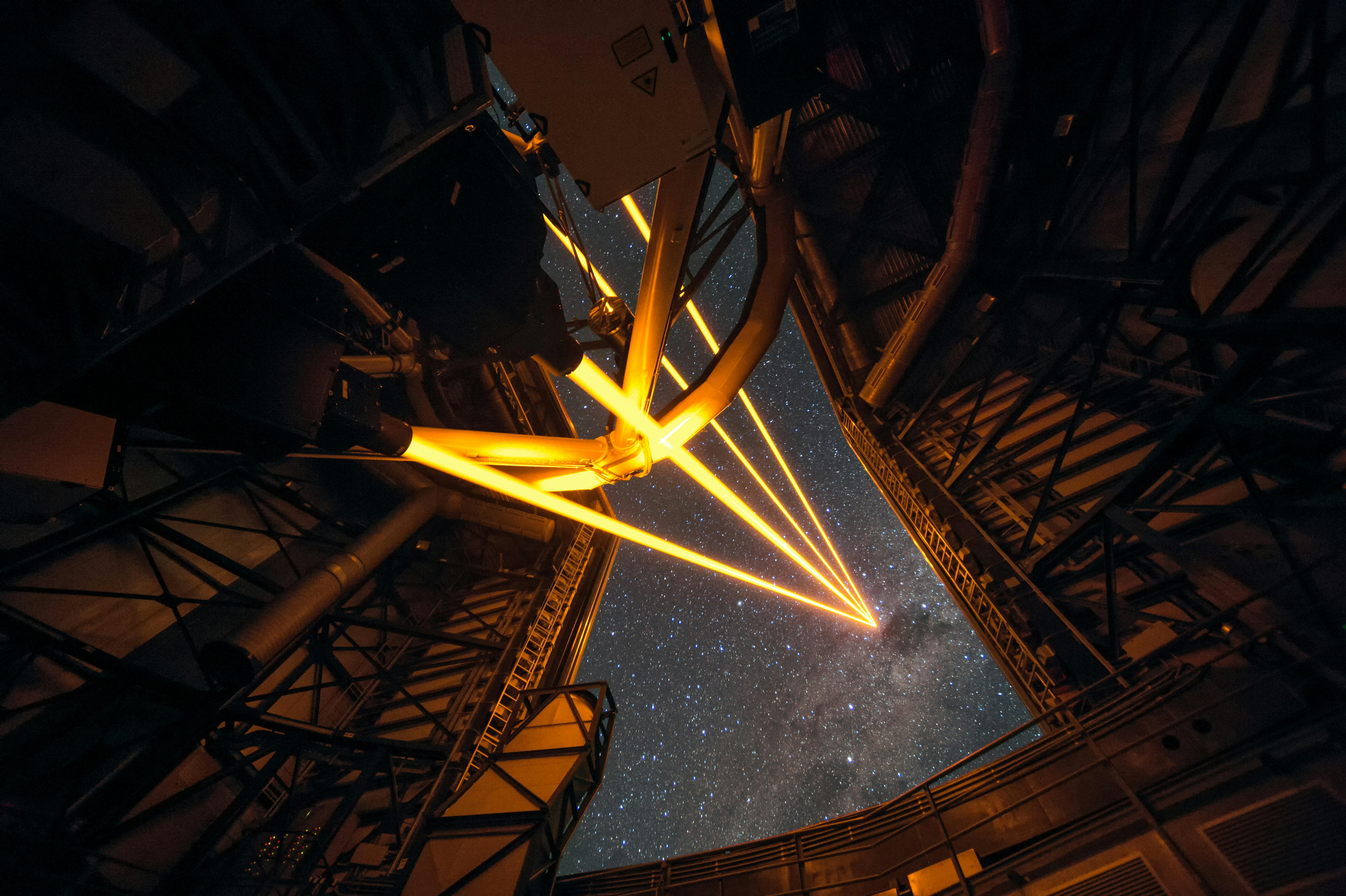 ESO&rsquo;s Paranal Observatory in Chile marked the brilliant first light for the four powerful lasers that form a crucial part of the adaptive optics systems on ESO&rsquo;s Very Large Telescope. These are the most powerful laser guide stars ever used for astronomy and mark the first use of multiple laser guide stars at ESO. This image shows the four beams emerging from the new laser system on Unit Telescope 4 of the VLT.