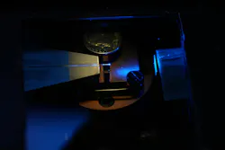 Shot of the team’s chip glowing blue. Shot of the team’s chip glowing blue.