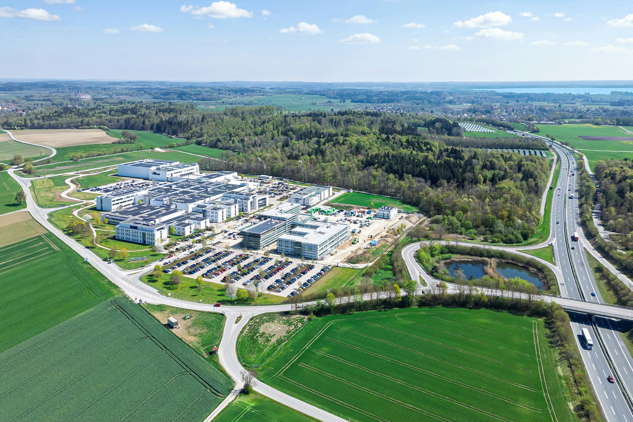 Aerial view of the DELO site in Windach including the 'Forum' and new laboratory building construction projects
