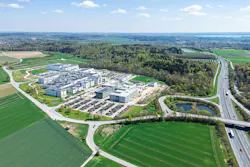 Aerial view of the DELO site in Windach including the 'Forum' and new laboratory building construction projects Aerial view of the DELO site in Windach including the 'Forum' and new laboratory building construction projects