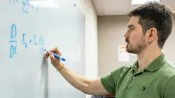 Kirill Lezhnin with his white board. Kirill Lezhnin with his white board.
