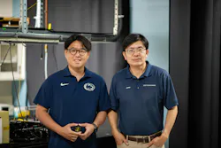 Yu-Jie Lin (left) holds the metalens the group developed, and Professor Zhiwen Liu is on his right. Yu-Jie Lin (left) holds the metalens the group developed, and Professor Zhiwen Liu is on his right.