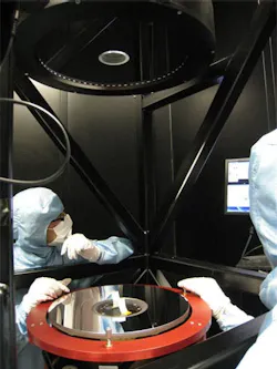 A 475mm diameter optical flat used as a reference surface to check the accuracy of the integration of the main mirrors in a satellite payload structure (courtesy: Optical Surfaces Ltd.) A 475mm diameter optical flat used as a reference surface to check the accuracy of the integration of the main mirrors in a satellite payload structure (courtesy: Optical Surfaces Ltd.)
