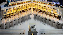 In an array consisting of 20 rows, each with 100 individually controllable laser foci, Rydberg atoms can be positioned at the required distance of 3.5 µm from one another. To achieve this, the setup—comprising cascading beam splitters, acousto-optic deflectors, lenses, and mirrors—splits four initially incoming laser beams into 2,000 individually controllable beams.