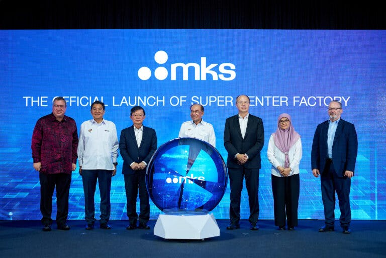 Official Opening on Stage. Left to right: Mr. David Gamble, Charg&eacute; d&rsquo;Affaires at U.S. Embassy Kuala Lumpur; YB Tuan Sim Tze Tzin, Deputy Minister of Malaysia Investment, Trade and Industry; YAB Tuan Chow Kon Yeow, Chief Minister of Penang; YAB Dato&rsquo; Seri Utama Anwar bin Ibrahim, Prime Minister of Malaysia; Mr. John T.C. Lee, President and CEO, MKS Inc.; Ms. Zuaida Abdullah, Deputy CEO Malaysian Investment Development Authority; Mr. Jim Schreiner, EVP and COO, MKS Inc.