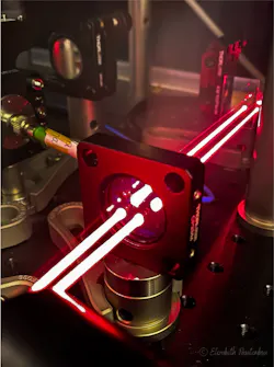 Acousto-optic modulators add controllable frequency shifts and actively stabilized intensity control to red laser light used to control the atom’s quantum state.