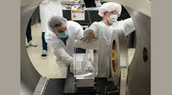UC Riverside and LIGO Laboratory researchers move a 40-kg LIGO mirror into position to test a prototype FROSTI wavefront actuator in vacuum.