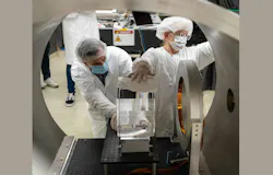 UC Riverside and LIGO Laboratory researchers move a 40-kg LIGO mirror into position to test a prototype FROSTI wavefront actuator in vacuum.