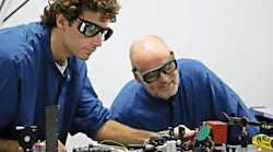 Andrea Arduin (left) and Professor Ole Bang, who heads the Fiber Sensors and Supercontinuum Group at DTU Electro, in the lab.