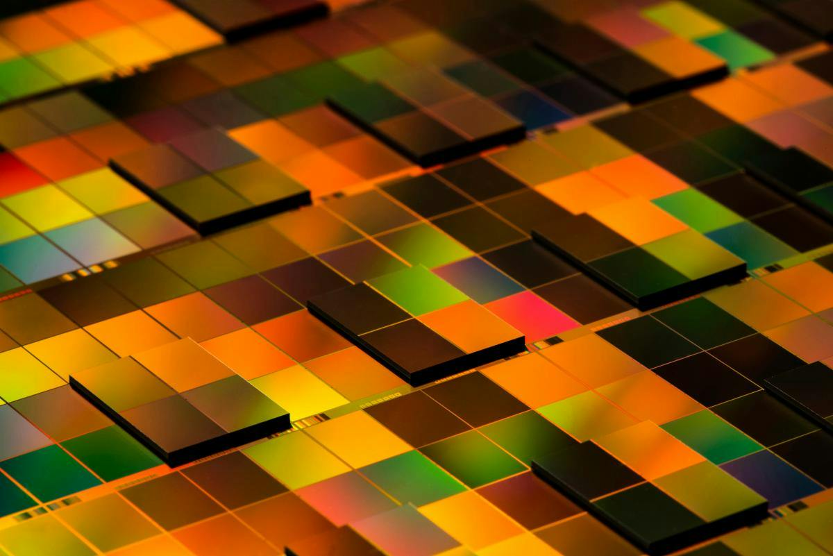Chiplet integration on a wafer enabled by collective die-to-wafer hybrid bonding.