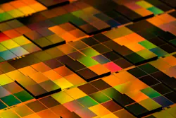Chiplet integration on a wafer enabled by collective die-to-wafer hybrid bonding.