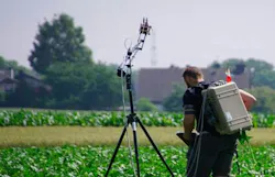 FIGURE 1. Hyperspectral imaging system operating in a field.